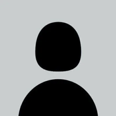 A simple silhouette of a person on a light grey background.