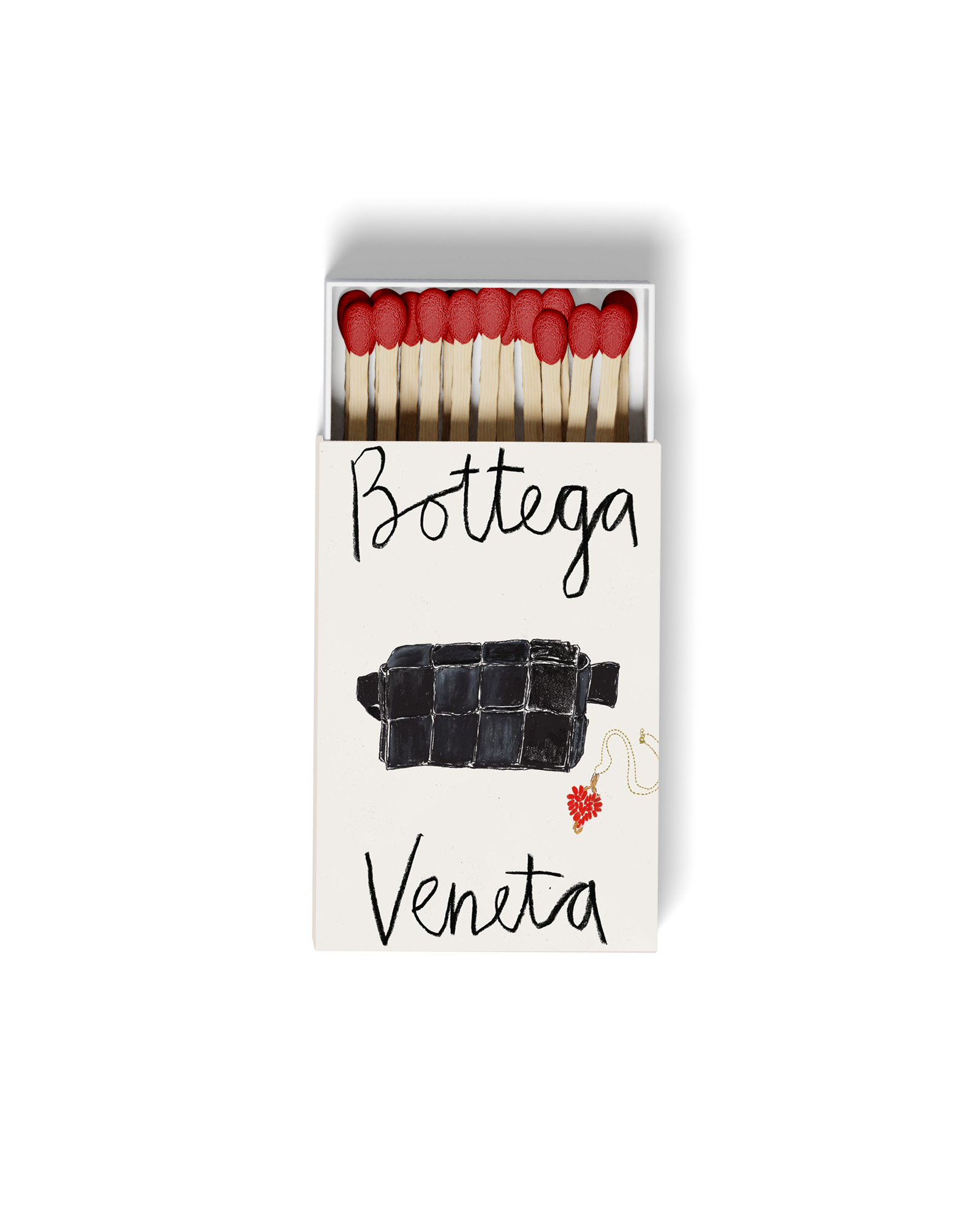 Matchbox with red-tipped matches and handwritten text 'Bottega Veneta' on the front, against a black background.
