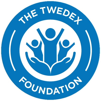 Logo of The Twedx Foundation featuring three stylized human figures in blue with their arms raised, surrounded by a circular border with the organization’s name.