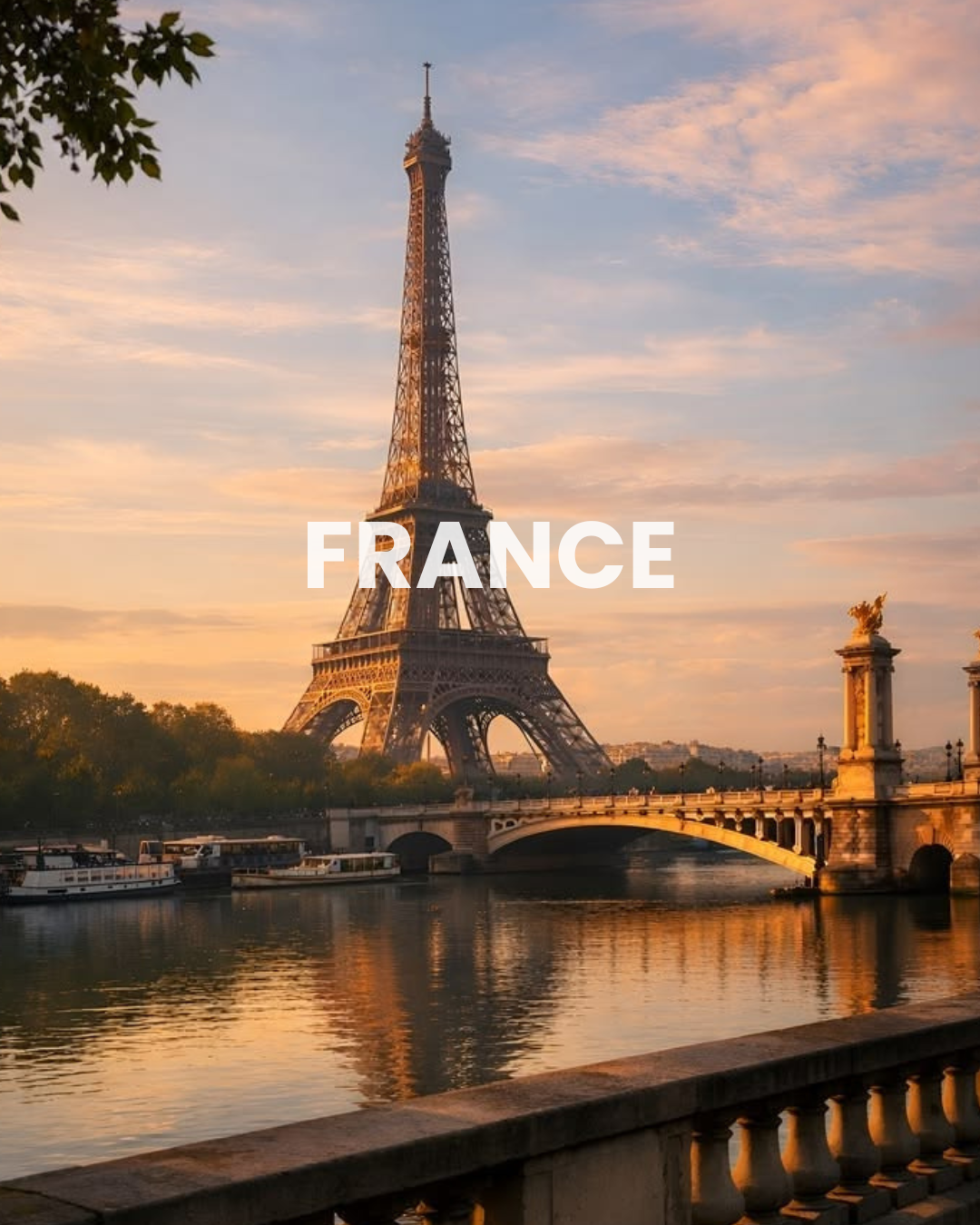 View of the Eiffel Tower in Paris, France at sunset, with the Seine River and boats in the foreground, and a cloudy sky.