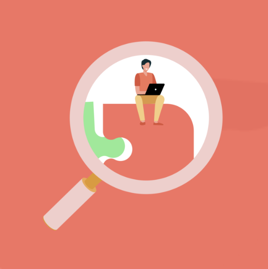 A person sitting on a large pipe looking at a laptop, viewed through a magnifying glass.