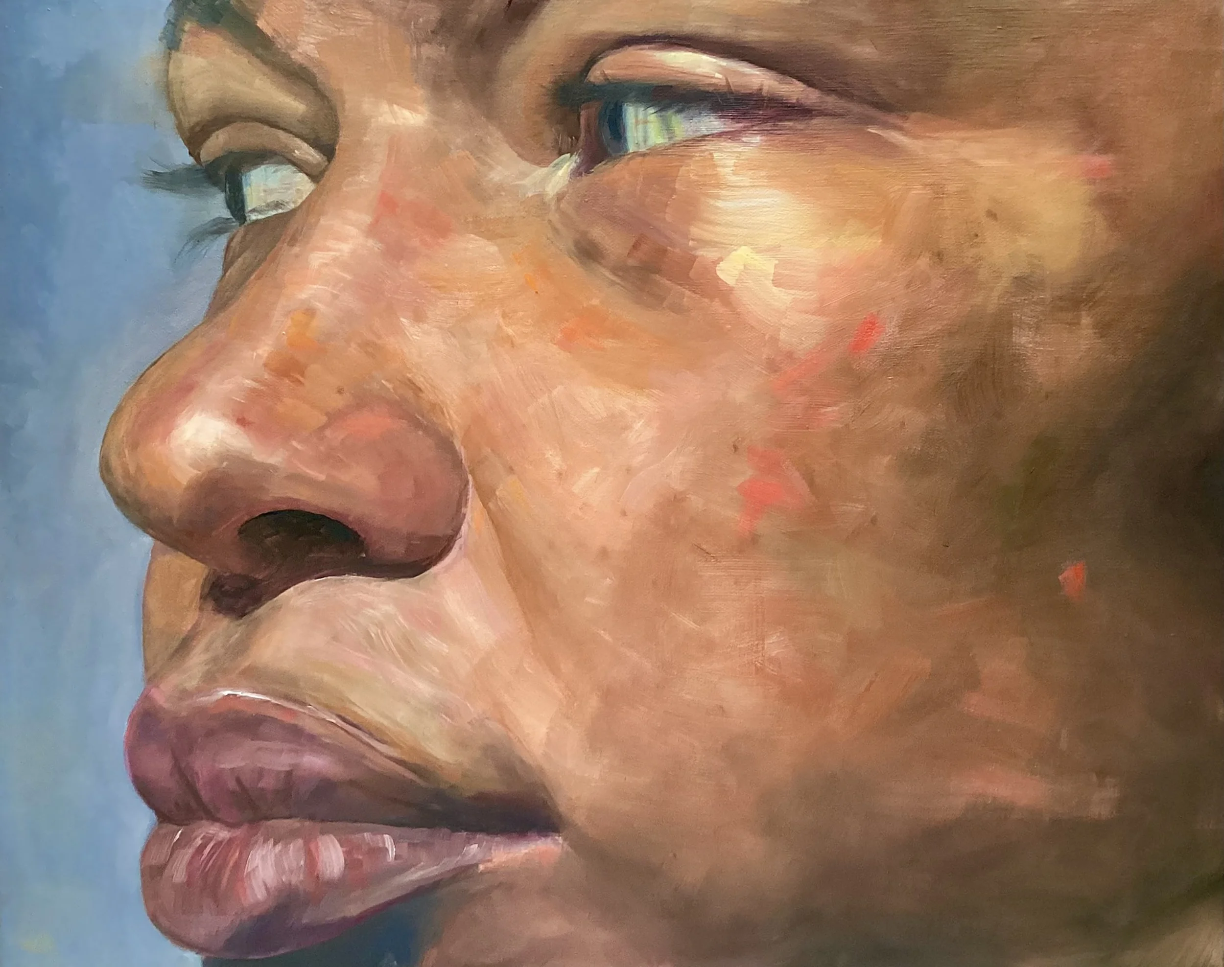 Close-up of a painting of a woman’s face, showing her eye, nose, and lips in a realistic style.