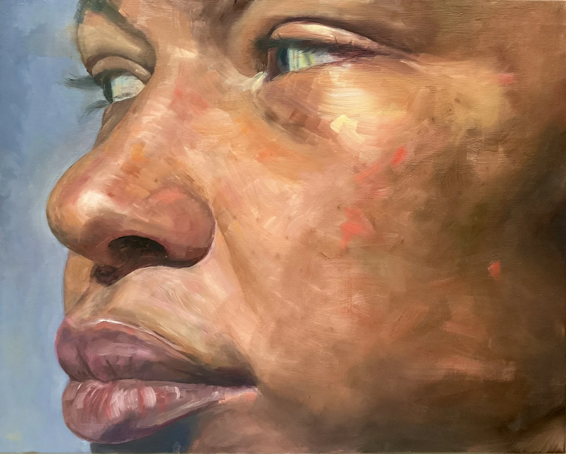 Close-up of a realistic portrait of a human face, focusing on the nose, lips, and eyes, rendered in warm tones with detailed brushstrokes.