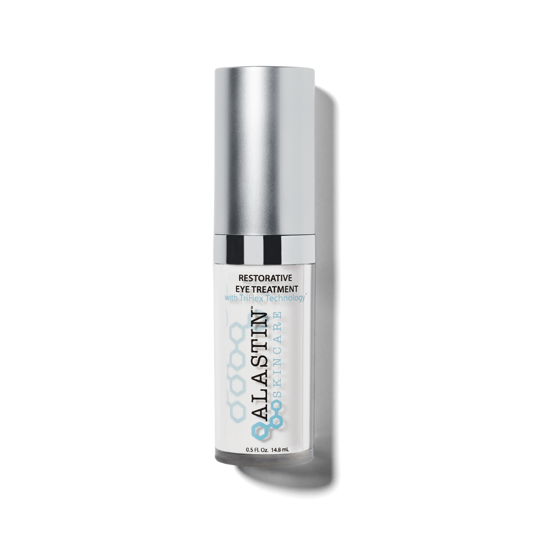 A bottle of AlyaSkin skincare restorative eye treatment with TriHex Technology inside a sleek silver and white container.
