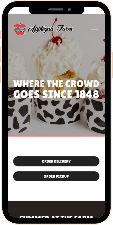 Mobile phone screen displaying the Applegate Farm website with images of ice cream sundaes, featuring a cherry on top and black-and-white patterned cups, and buttons for order delivery and pickup.