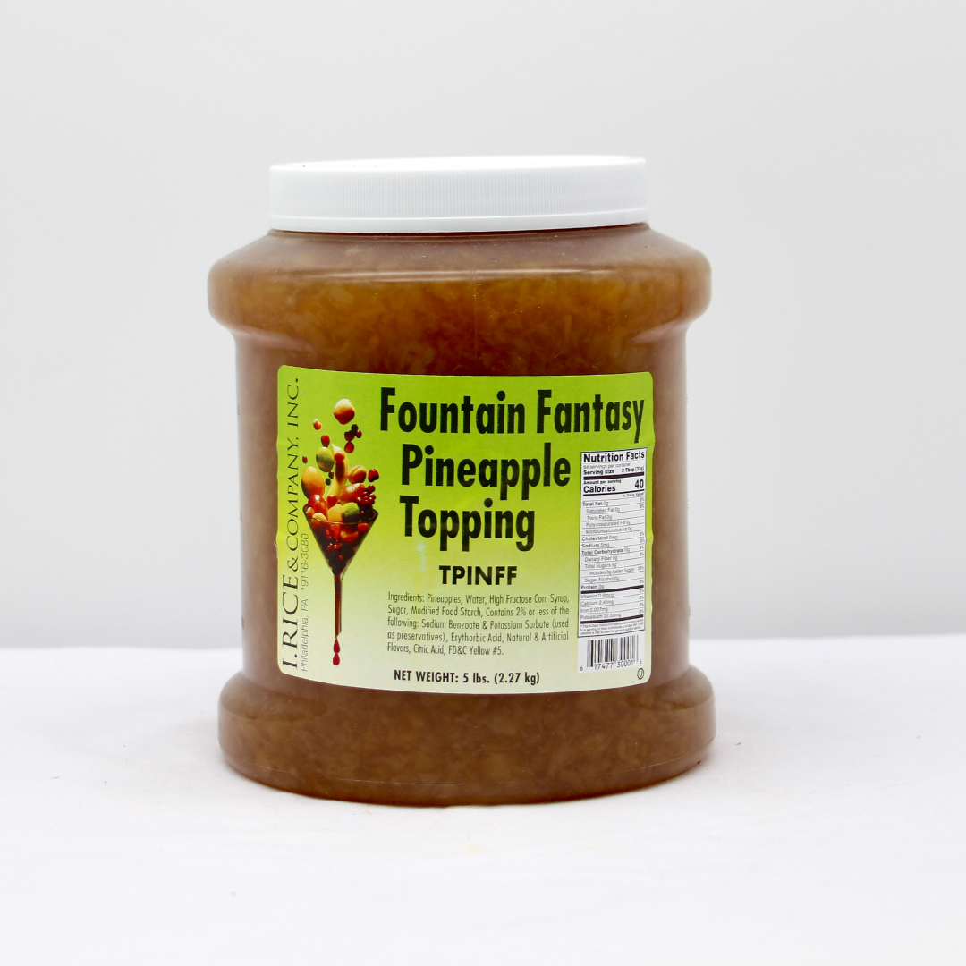 A jar of Fountain Fantasy Pineapple Topping with a white lid and a green label, showing ingredients and nutritional information.