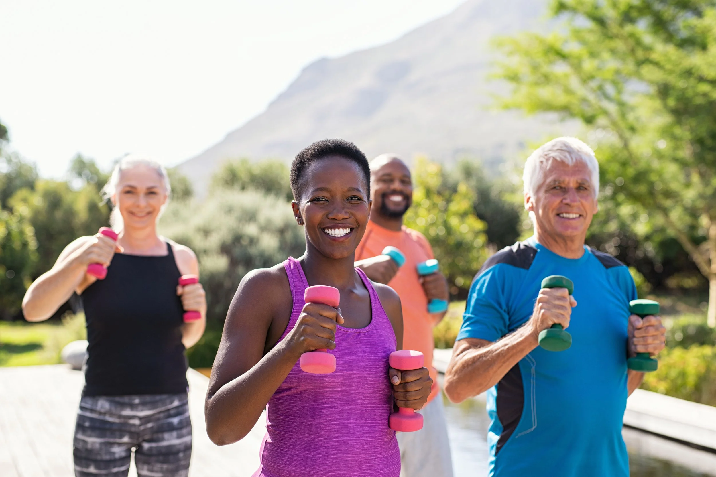 People exercising outdoors, supporting lung health with bronchiectasis tools
