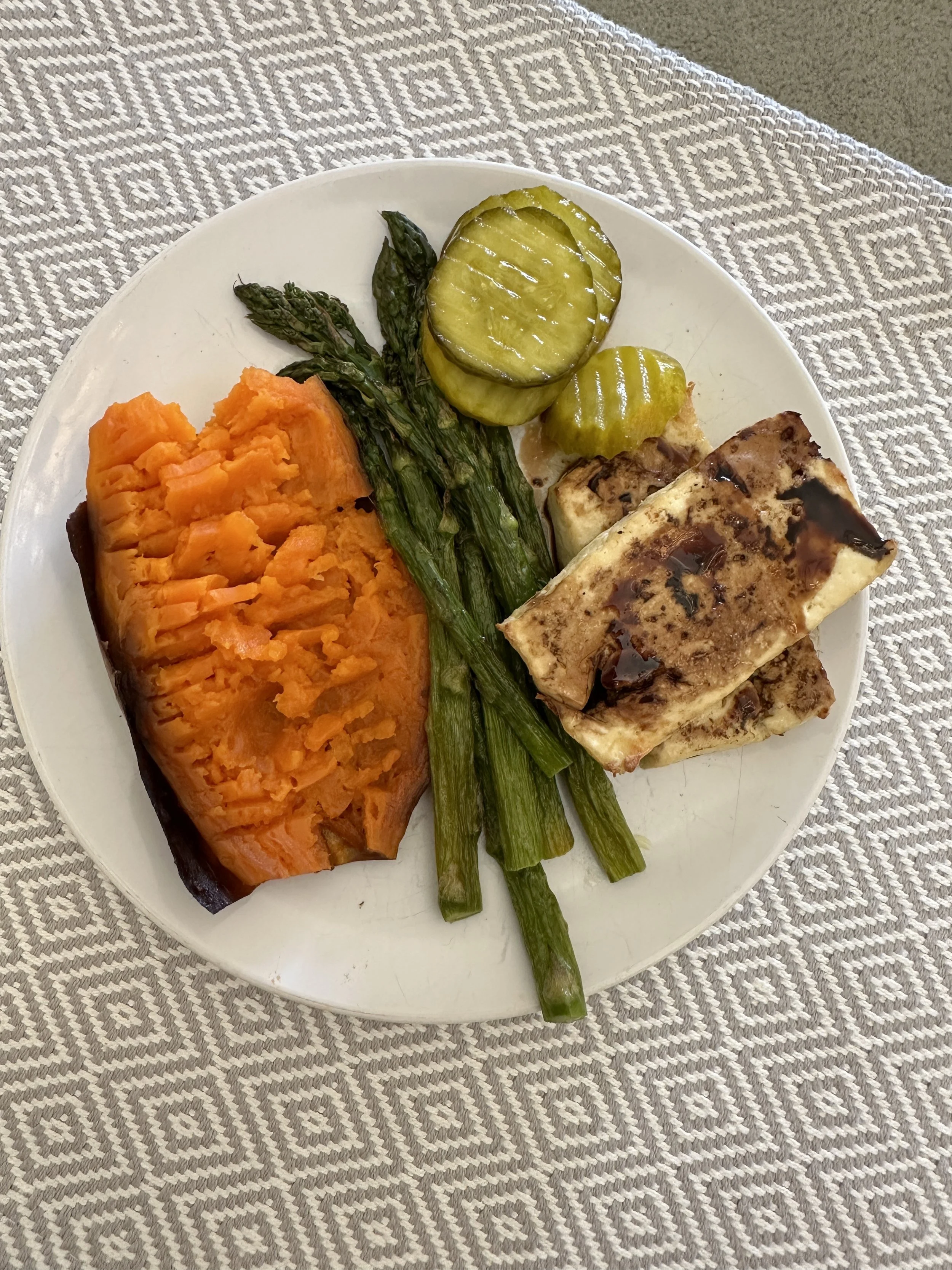 Protein-rich meal with tofu, sweet potato, and asparagus to support muscle repair and tissue healing
