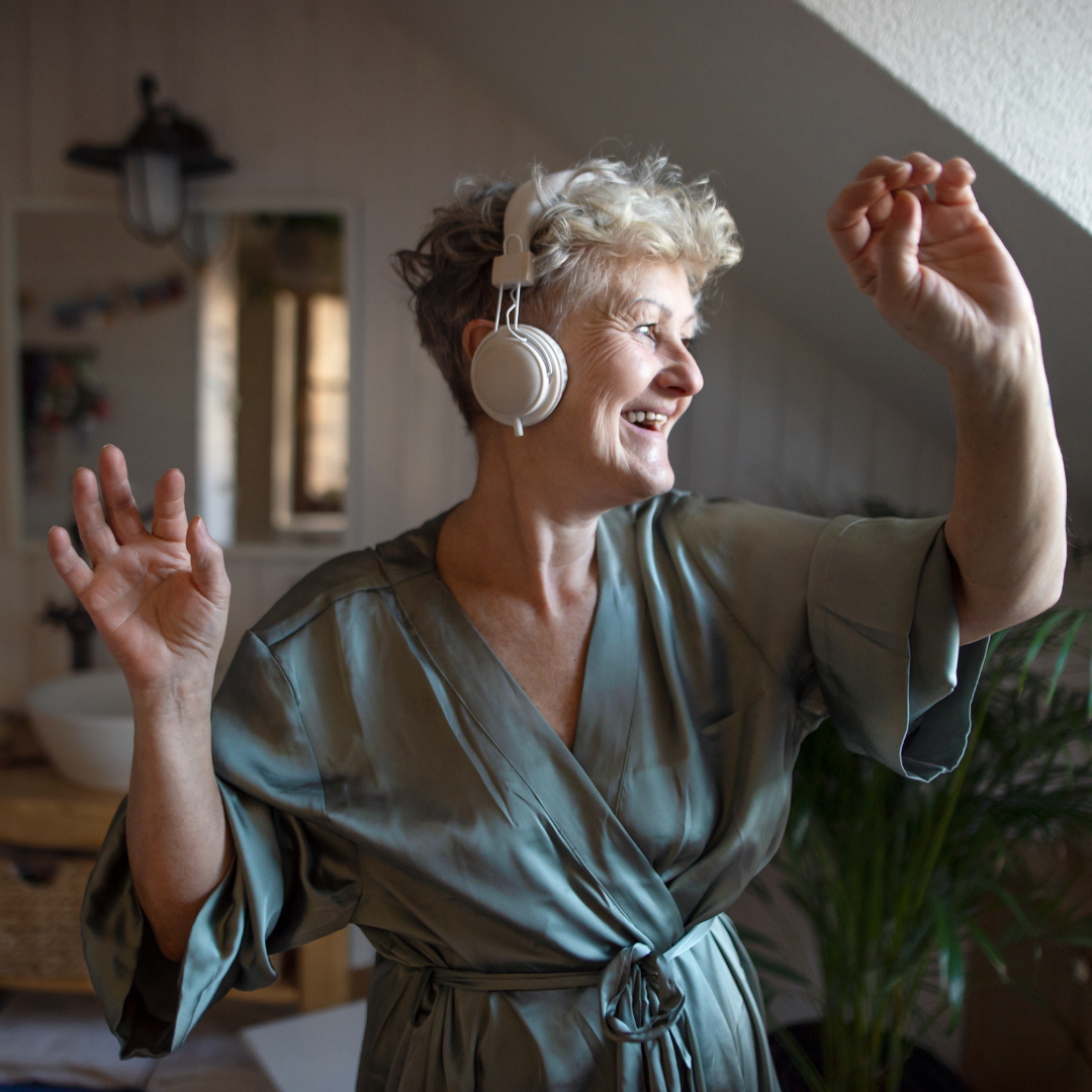 woman dancing and feeling well with bronchiectasis because she is following the BE CLEAR Method