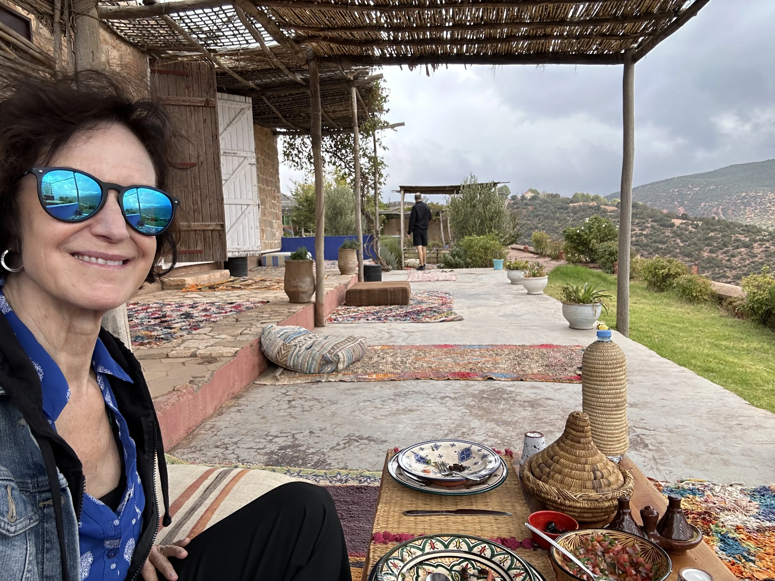 Linda Esposito feeling well and enjoying a traditional traditional meal on a Morroccan vacation