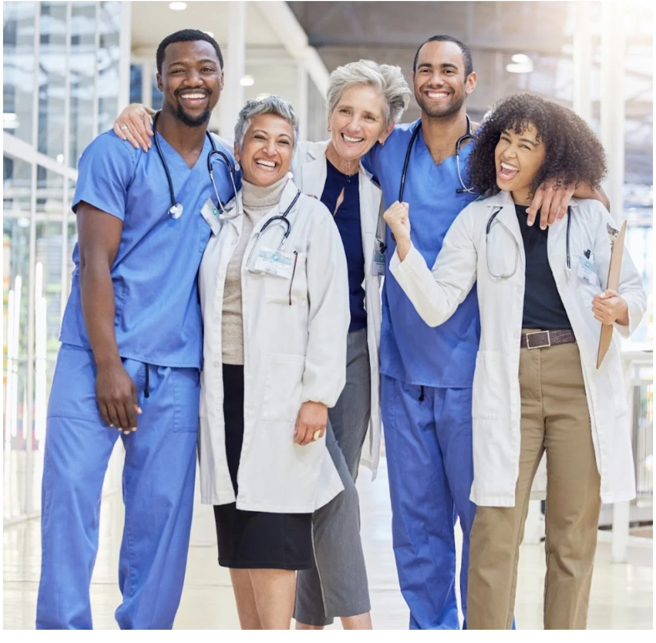 five smiling doctors standing in a bronchiectasis health center