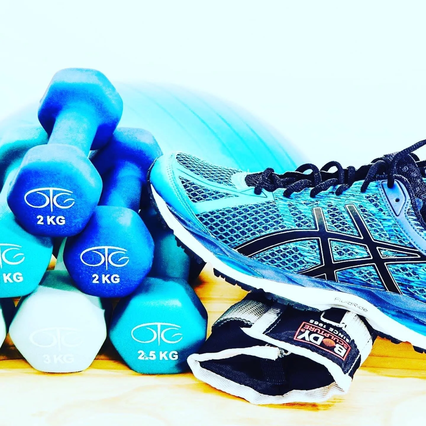 Sneaker and hand weights emphasizing the importance of exercise for people living with bronchiectasis and other chronic lung diseases
