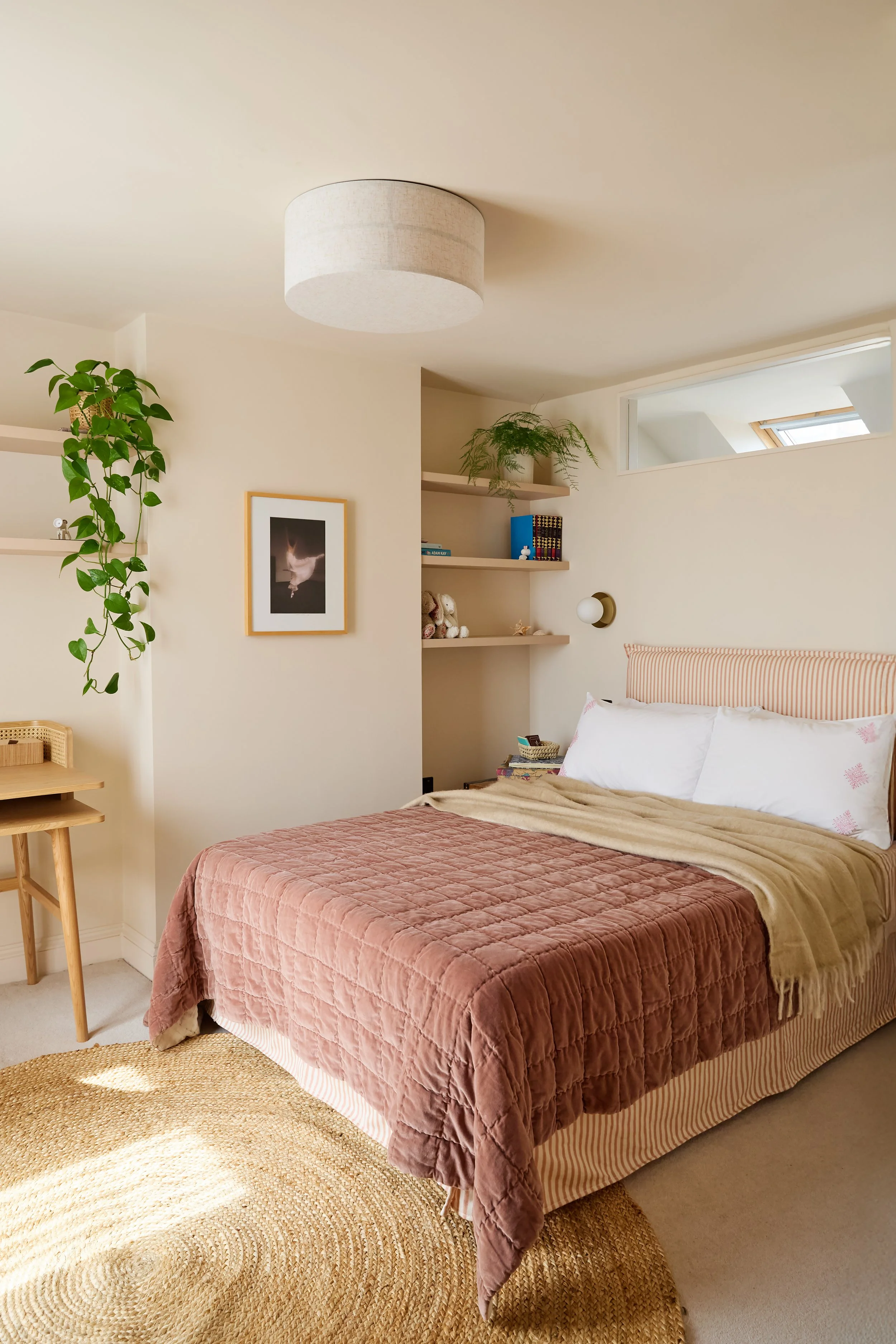 A previously underused loft was reimagined as a bright and welcoming teenage bedroom filled with natural light and bespoke details.