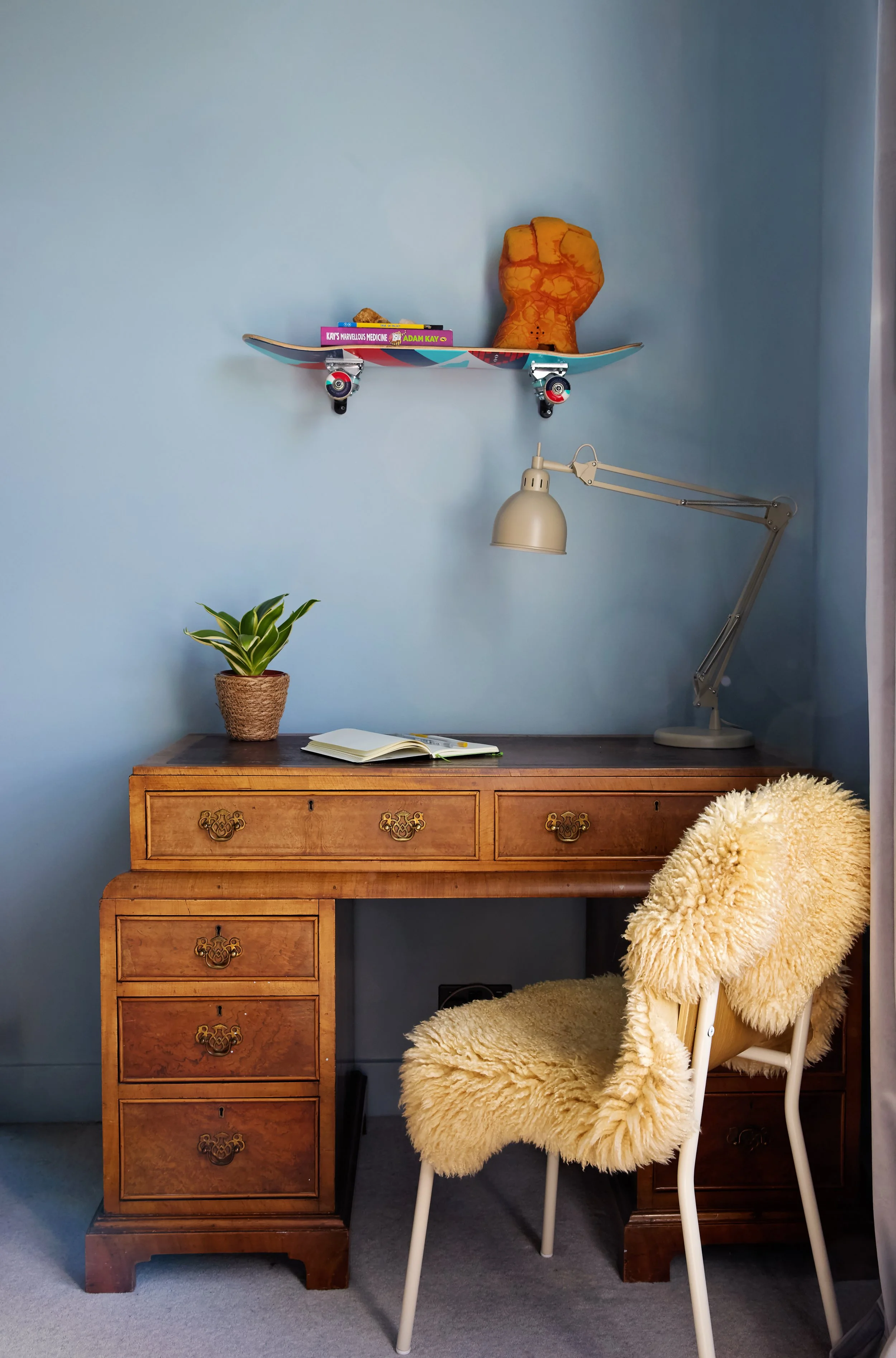 Existing furniture (family's antique desk) was carefully repurposed and combined with thoughtful styling to create a dedicated study space.