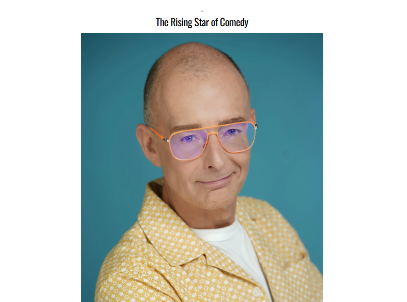 Mark Orintas smiling in clear-framed glasses and a patterned shirt for his comedy article feature, The Rising Star of Comedy.