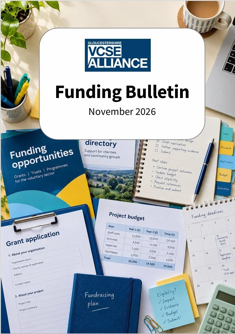 Front cover of the Funding Bulletin - a photo of a desk covered in fundraising paperwork along with the title.