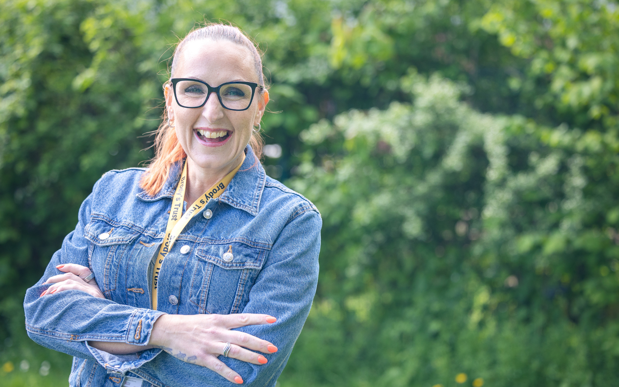 Nicola Baggott, trustee of Brody's Trust laughing with crossed arms