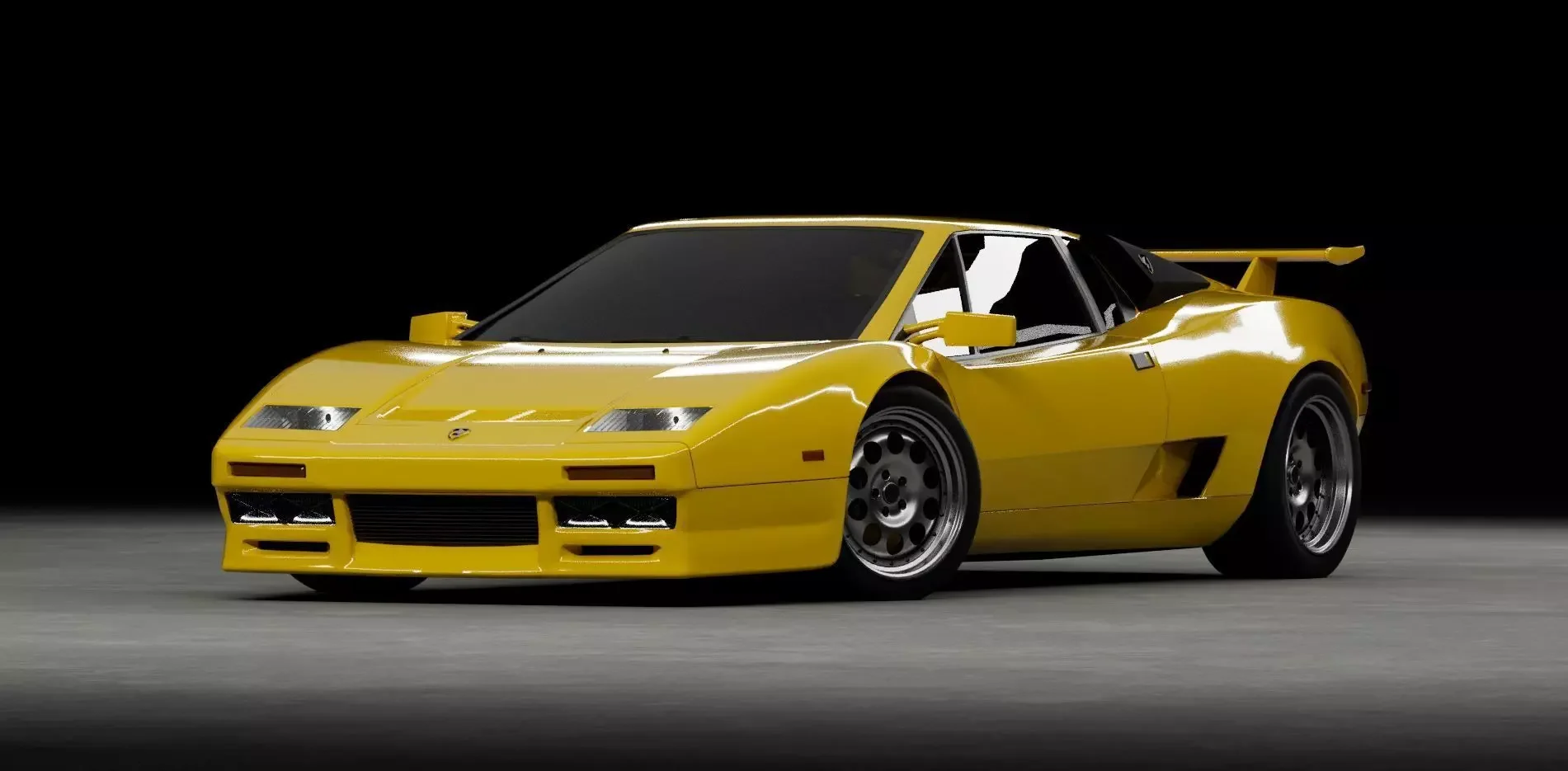 A yellow vintage race car with a sleek, aerodynamic design, low profile, and rear spoiler, set against a black background.