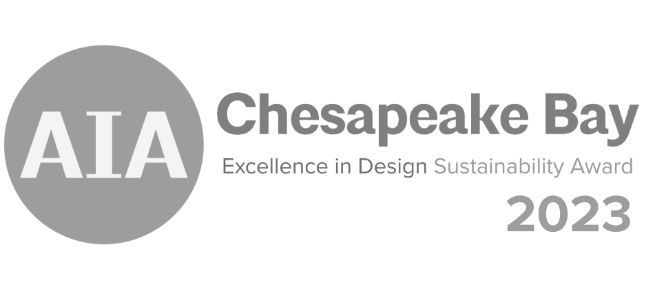 AIA Chesapeake Bay 2023 Sustainability Award Badge: Kimmel Interiors achievement in sustainable design and architectural integrity.