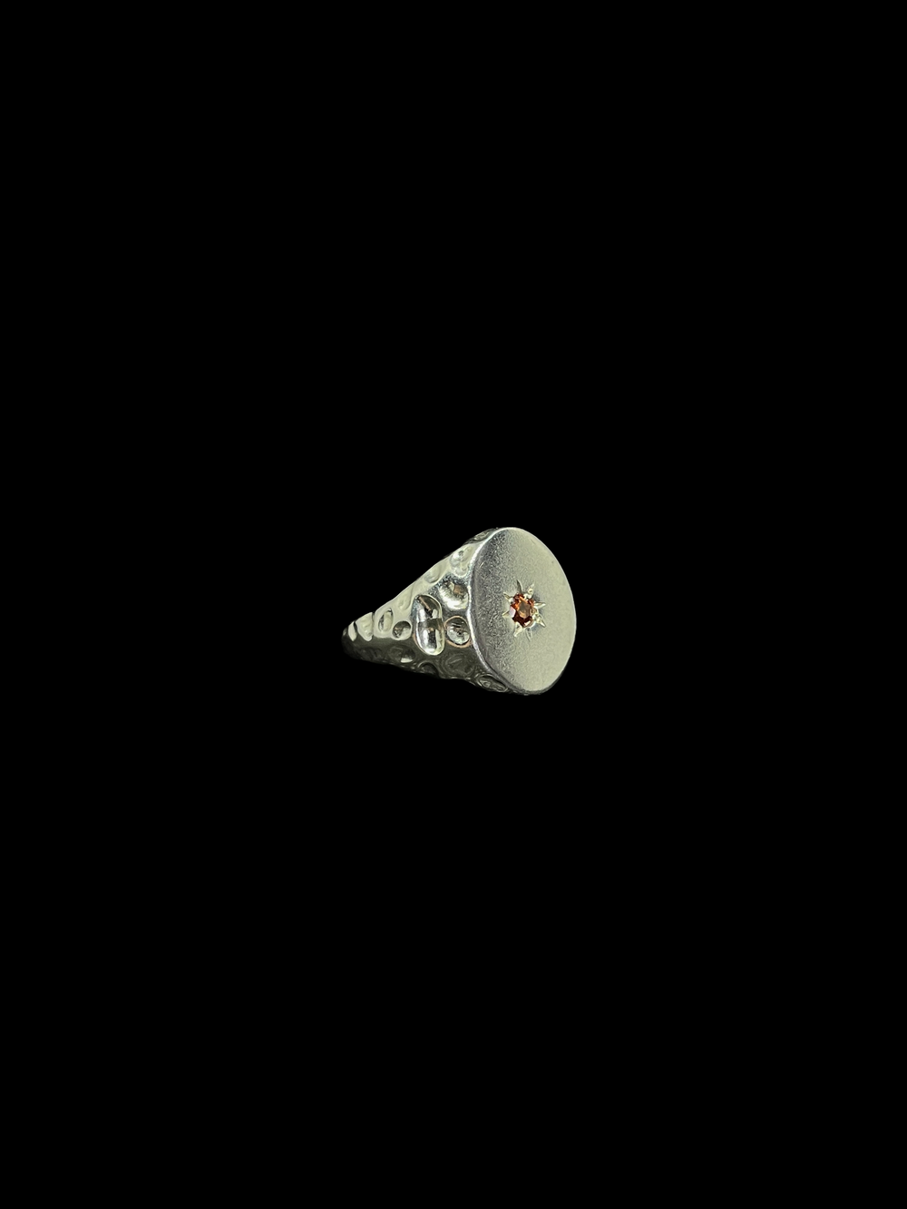 What a Beauty, a silver signet ring with a small set stone