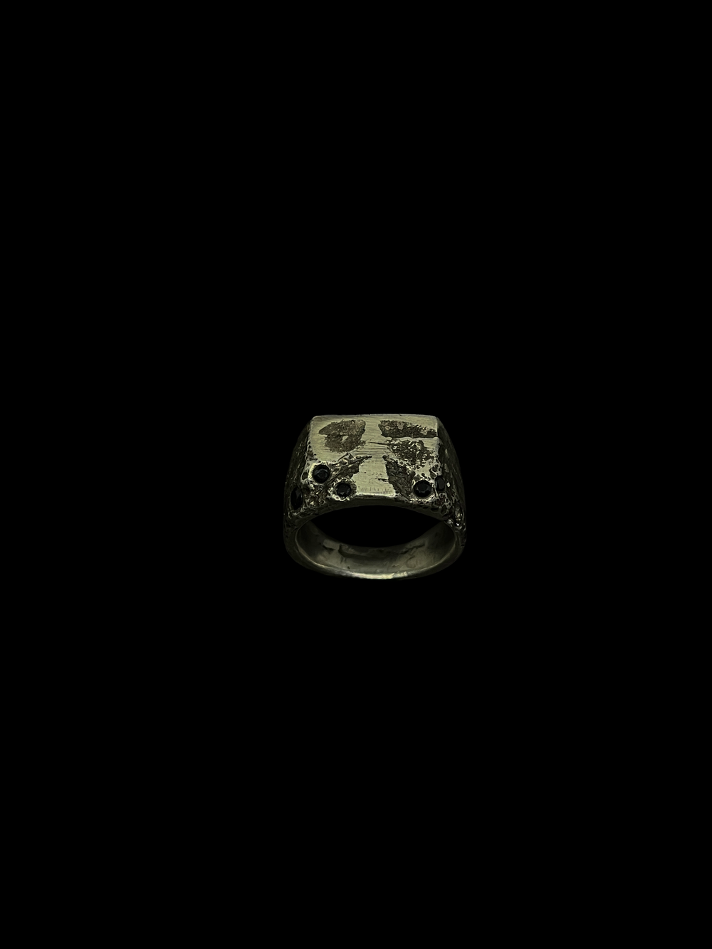 Silver Linings, a cast silver ring with hand-set stones