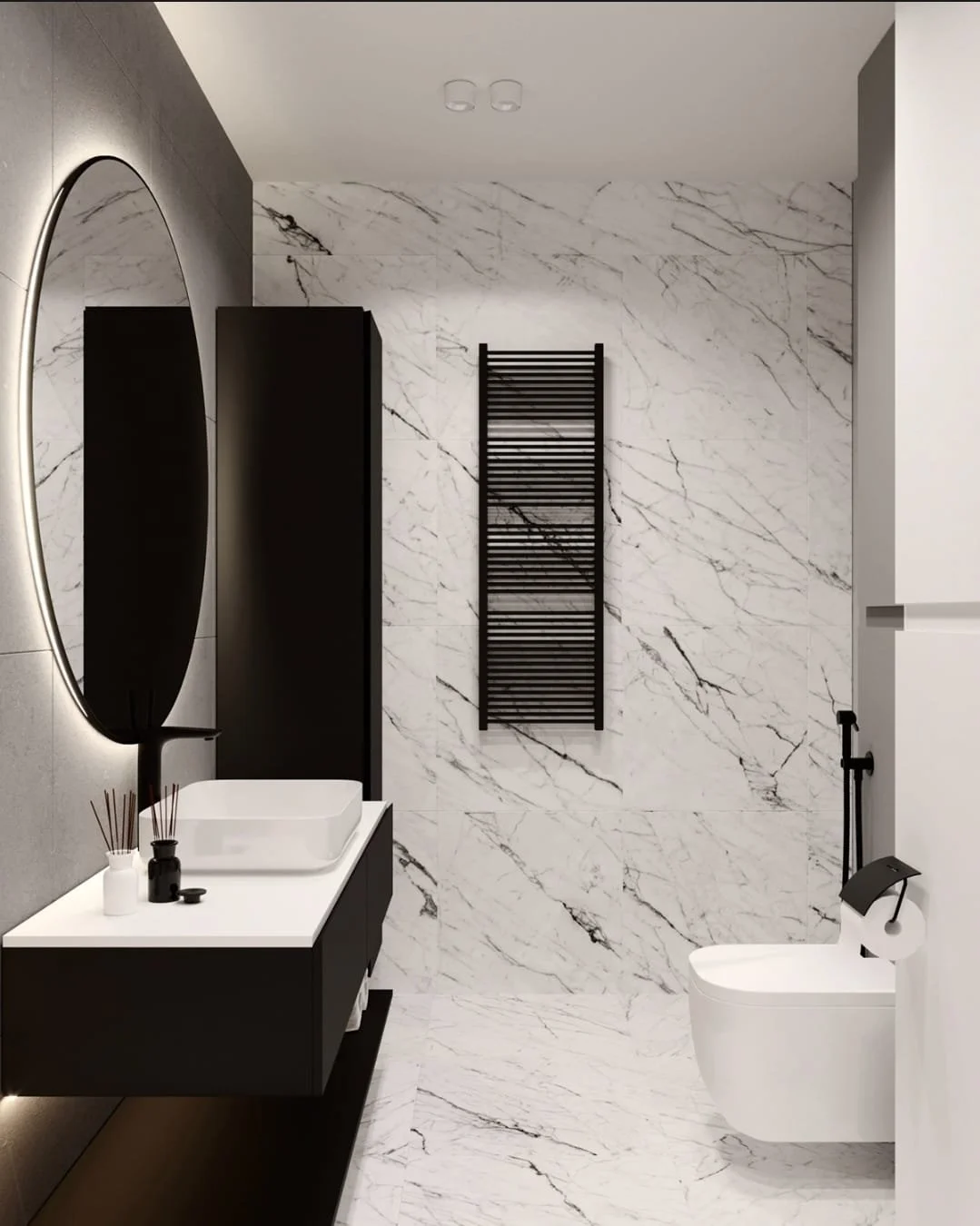 Modern bathroom with white marble walls and floor, black storage cabinet, black heated towel rack, white sink with black vanity, and a white wall-mounted toilet.