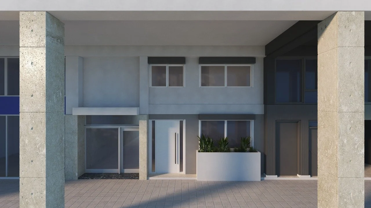 Front view of a modern apartment building entrance with large concrete columns and glass doors, featuring plants in a white planter box.