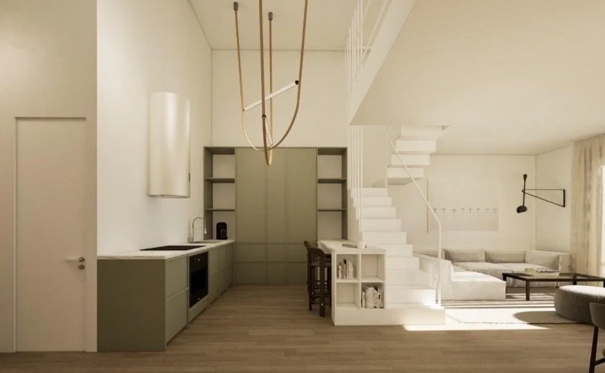 Open-concept living space with a kitchen, staircase, and living room with sofa and TV
