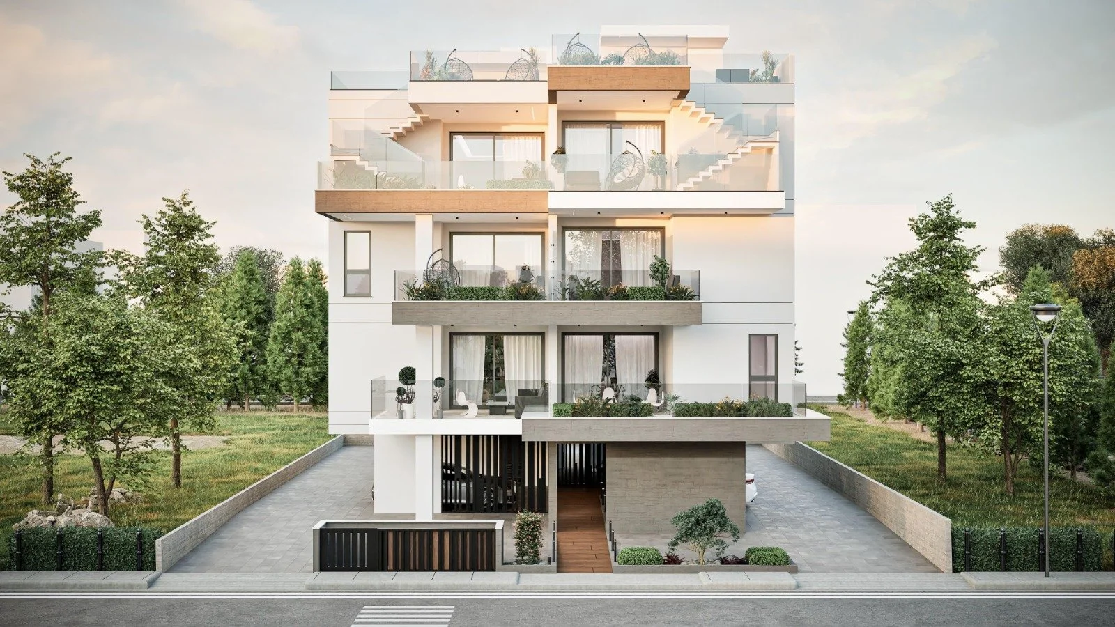 Modern multi-story apartment building featuring balconies with glass railings, surrounded by greenery and trees, with a paved driveway and street in the foreground. Greece, Investment, Golden Visa, Real Estate, Cyprus, Georgia, Lebanon, LPI, Athens.
