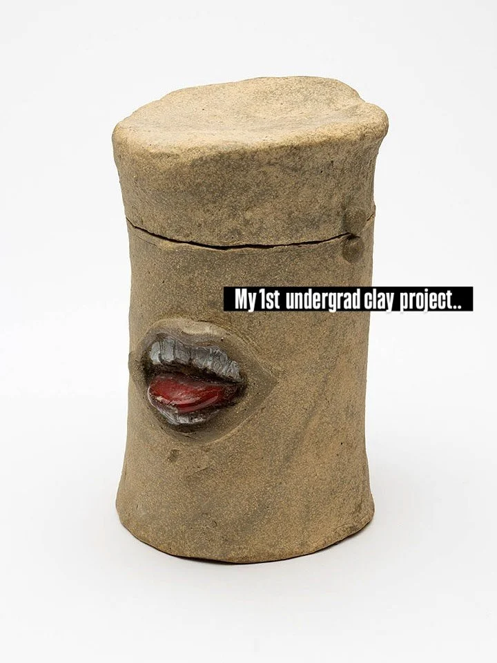 I took one ceramics class as an undergraduate and for unknown reasons HATED working in clay. Must be why I made the tongue sticking out as a gesture of defiance ? There is a mouth and tongue on 2 sides- it was a set of 3-4 canisters.  I save just thi