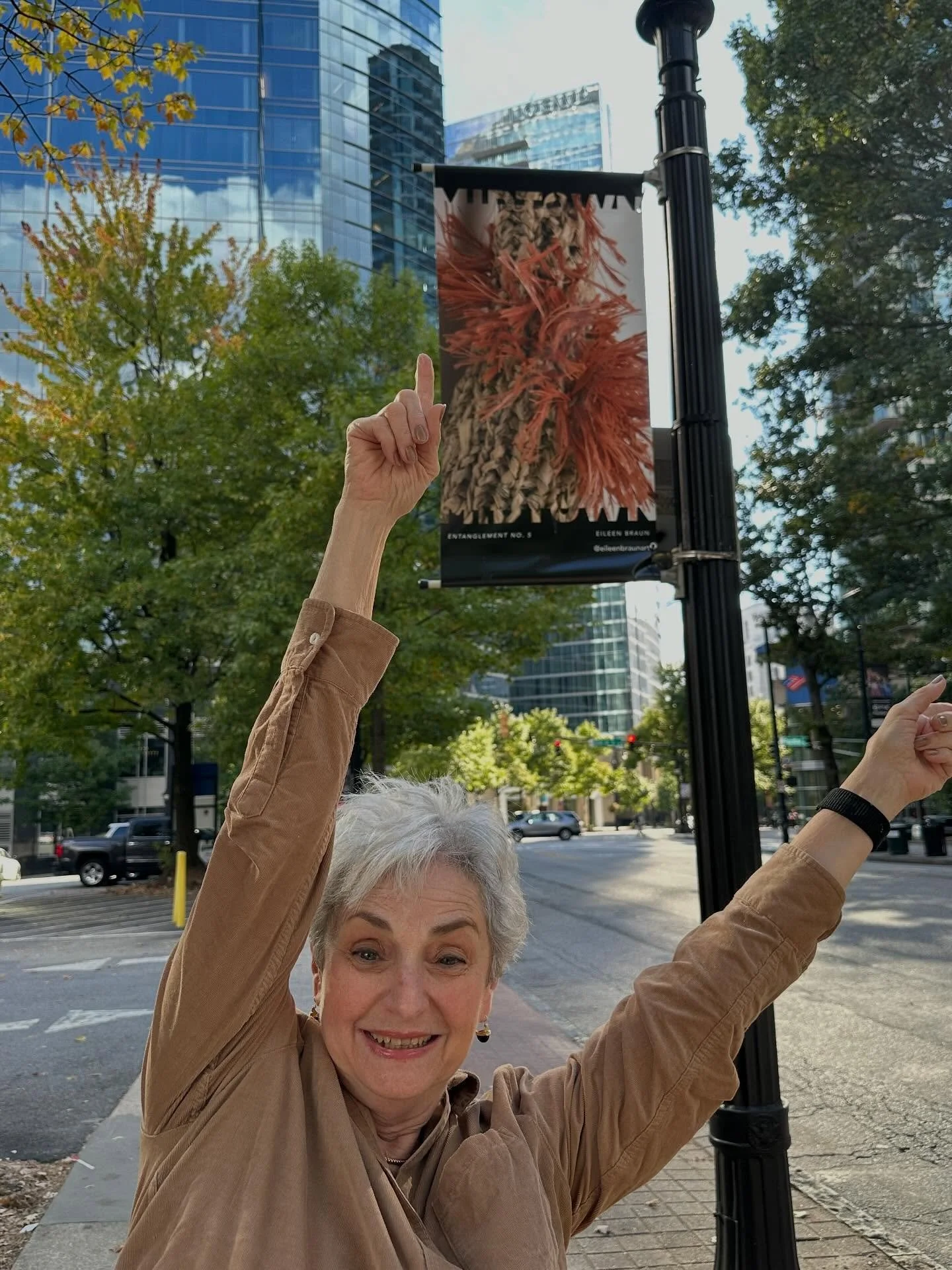 Thank you @Midtown Alliance for hanging a photo-banner of my salvaged paper-knit work on Peachtree Street between 12th and 13th Street East-Atlanta. Between High Art  Museum and Fox Theater. Took me a while before I could pose for my photo as I fract