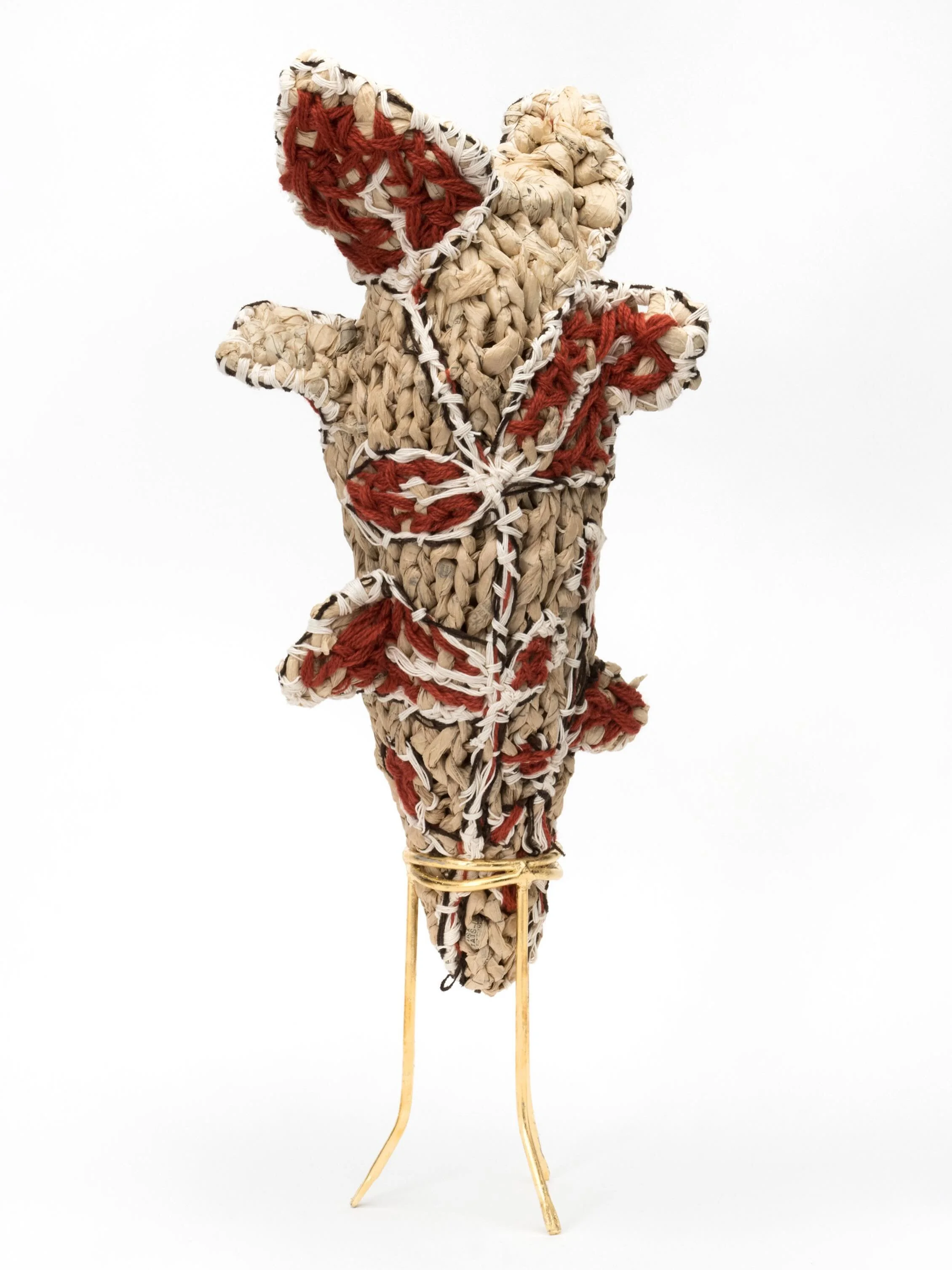 Vine. 2025. 25H x11W x11W with gold gilded stand. This was an experiment in 3D knitting my salvaged dressmaker&rsquo;s pattern tissue which I treat as a yarn. I was riffing off the crochet roses and leaf blankets of yesteryear. I made this last Fall 