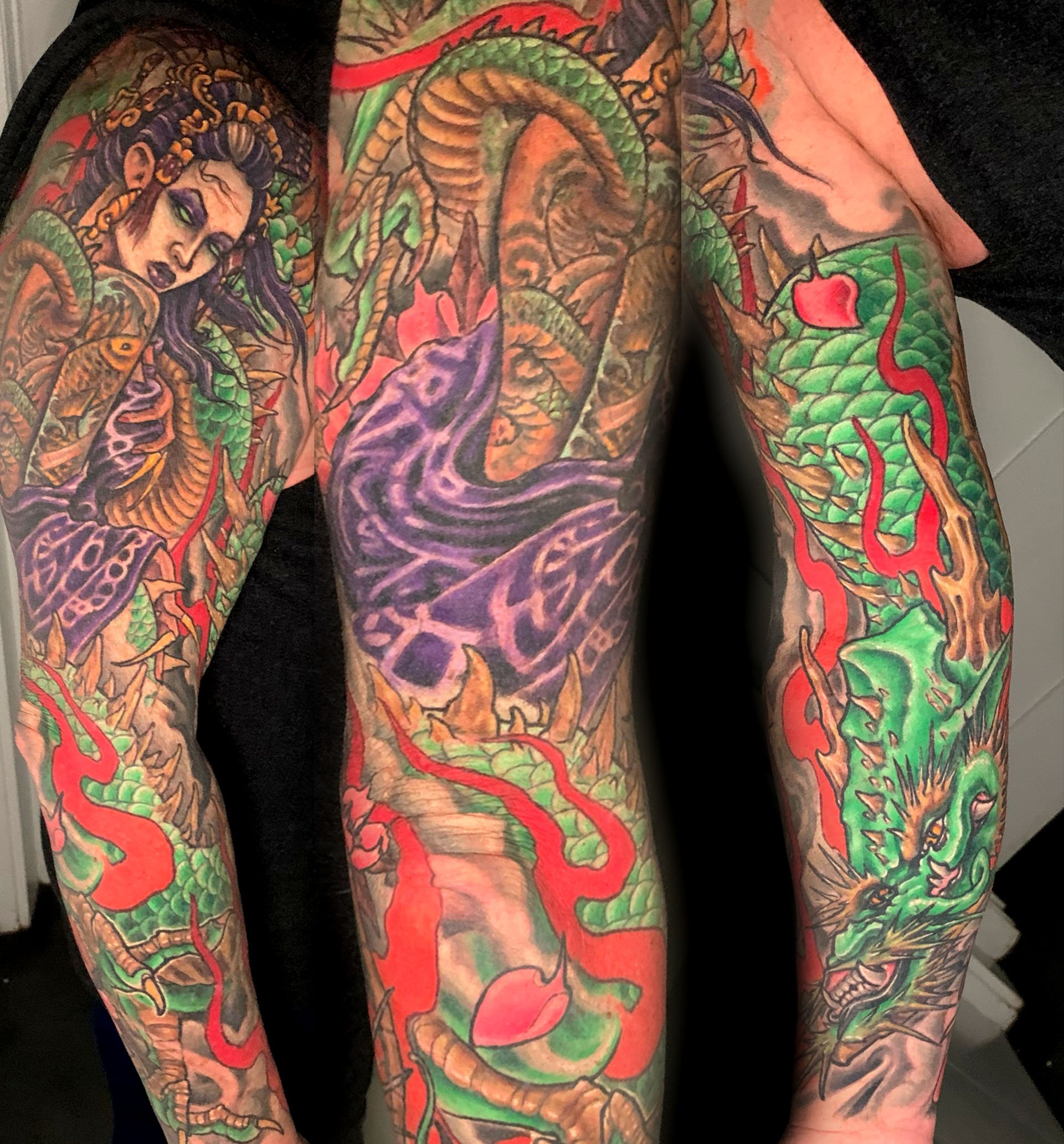 Colorful tattoo sleeve depicting a woman with flowing hair and a snake intertwined with leaves and a skull.