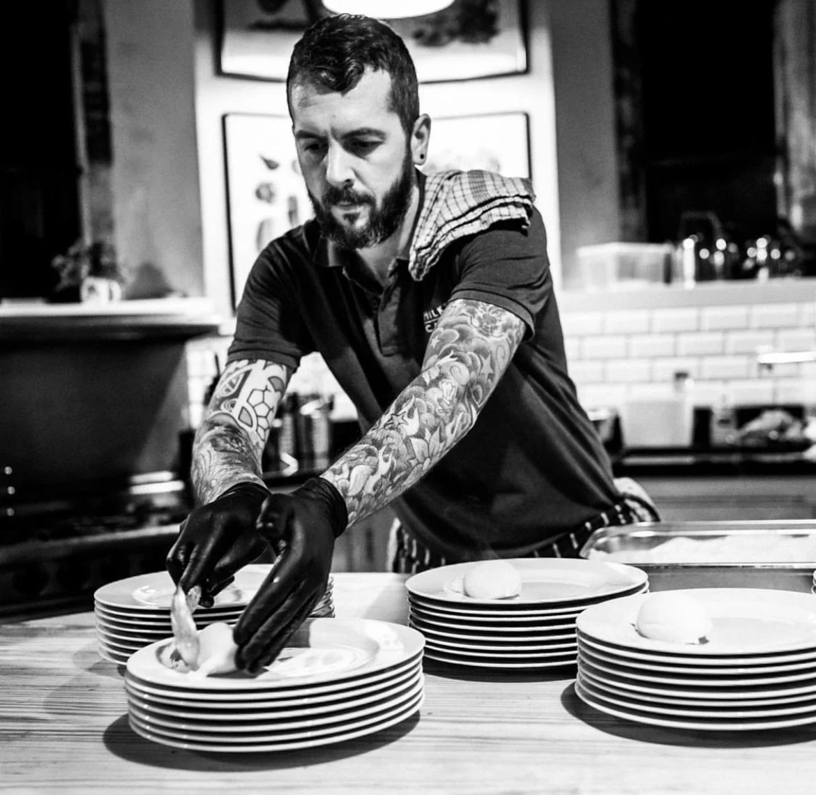 Head Chef plating up meals in the Huntsham Court kitchen.