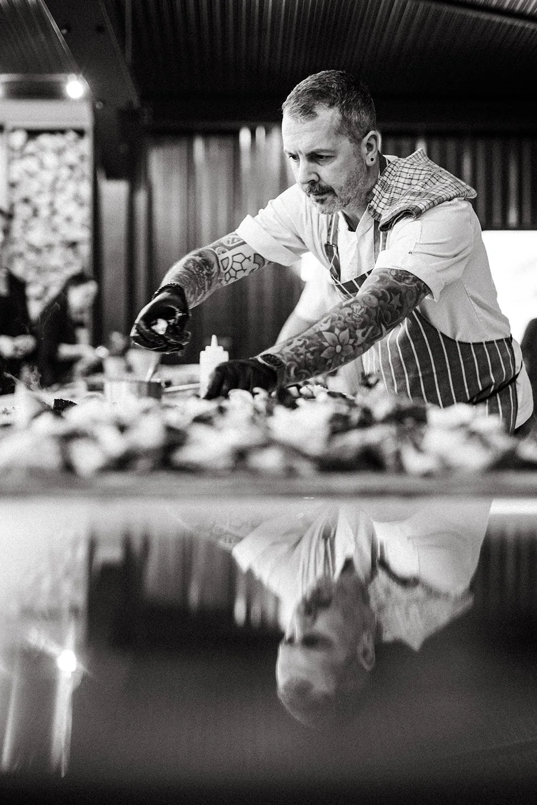 Head Chef plating up meals in the Huntsham Court kitchen.