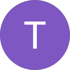 Purple circle with a white letter 'T' in the center.
