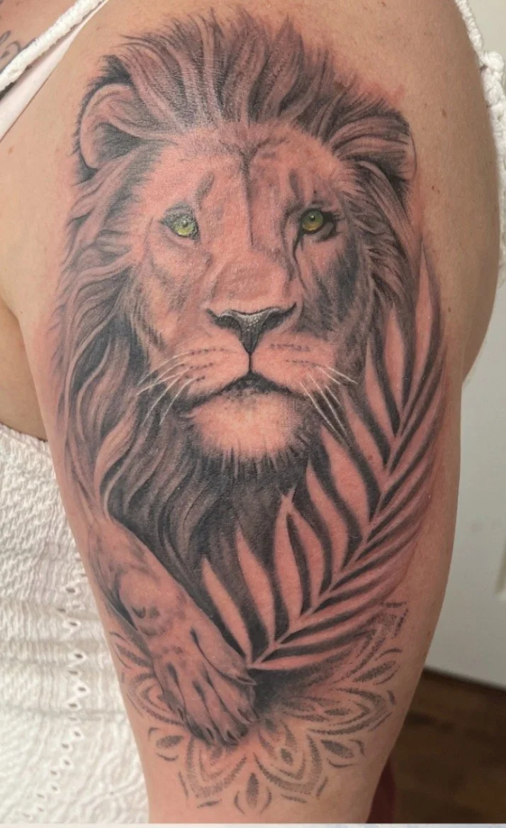 feminine mandala with lioness tattoo