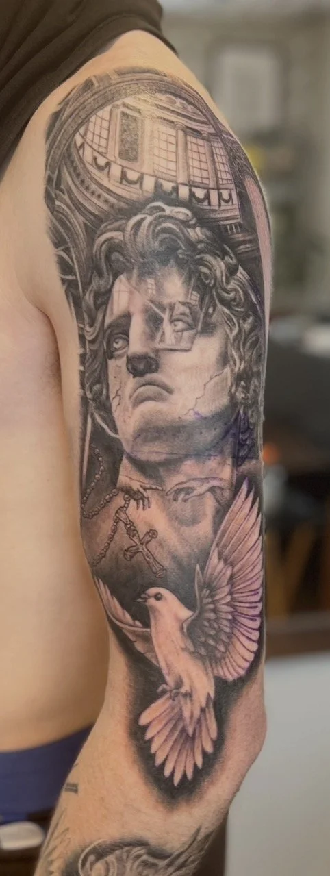 greek tattoo sleeve with a dove 