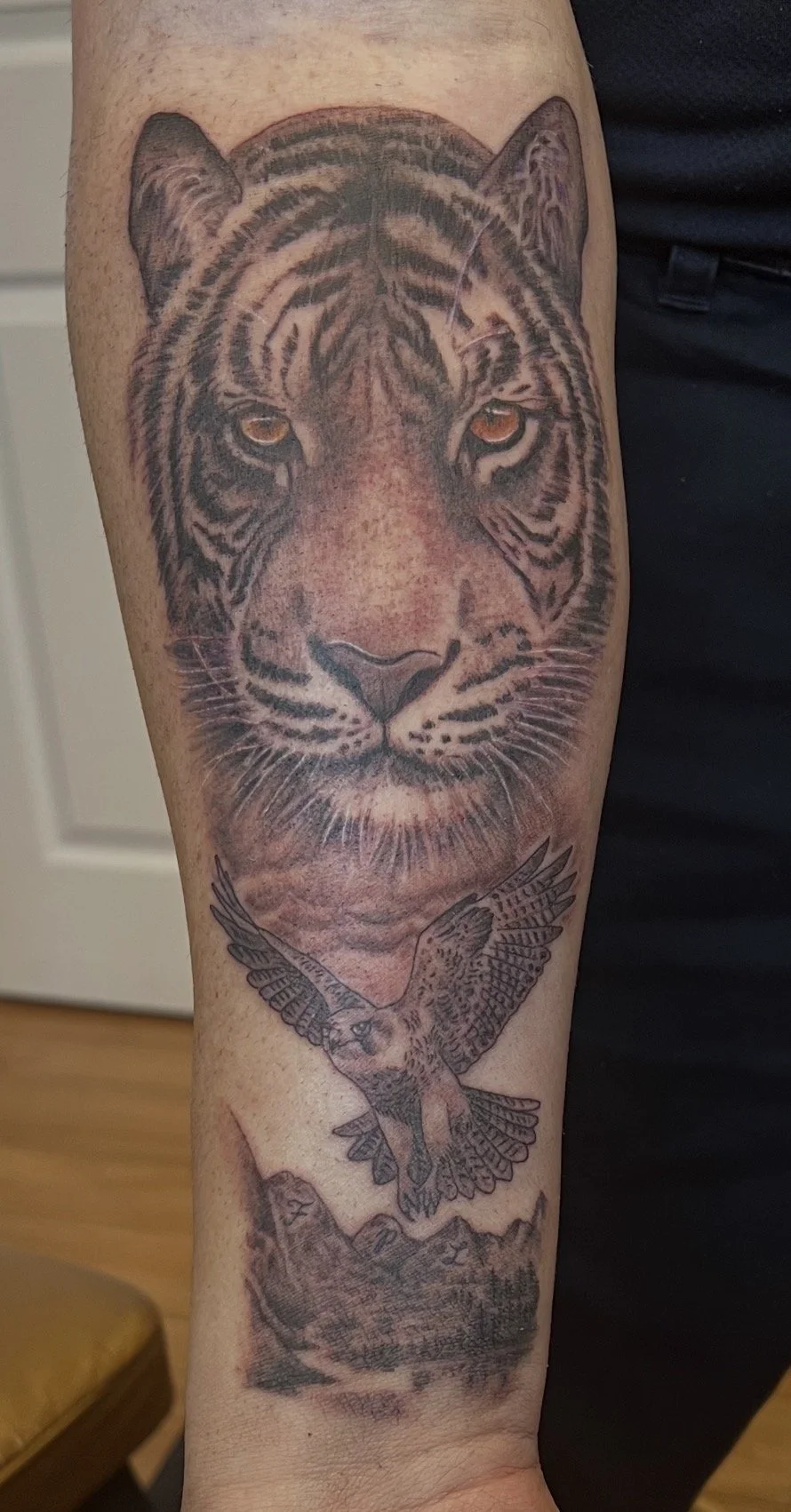 tiger tattoo with mountain