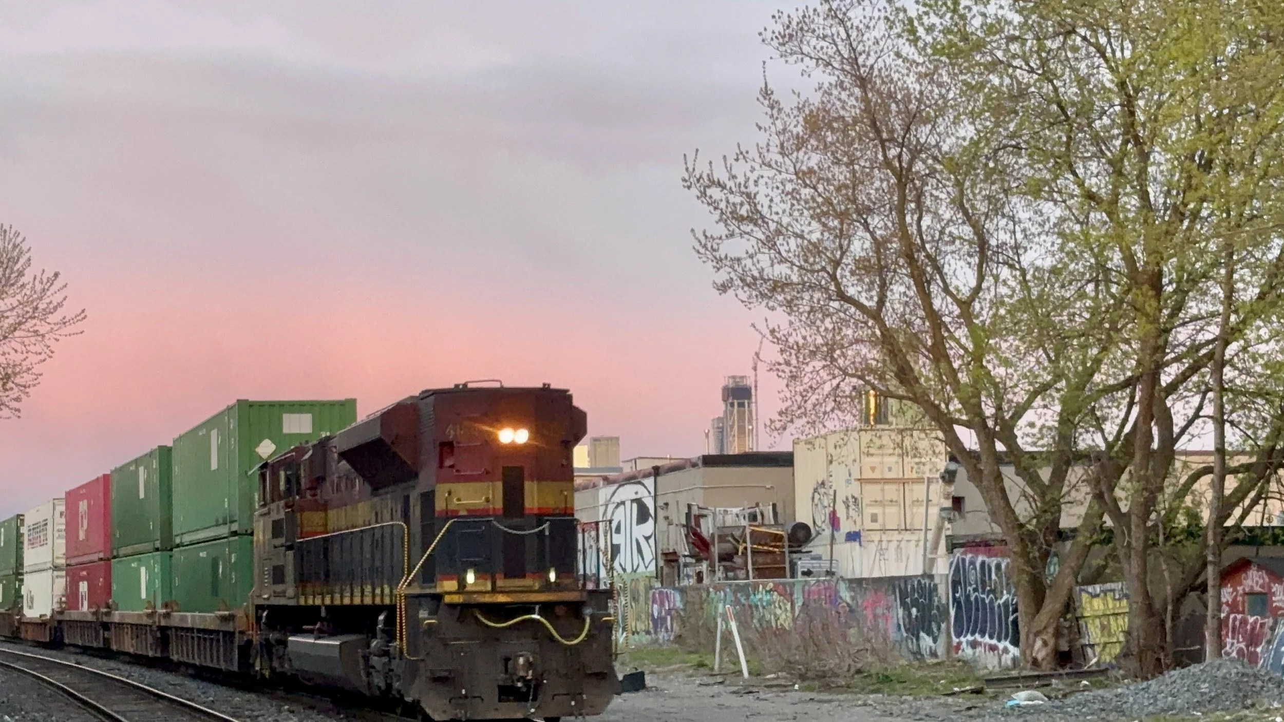 Kansas City Southern rips through Bartlett in the glow after a summer shower

Bartlett Av. b/w Geary Av./Dupont St.
May 1, 2026