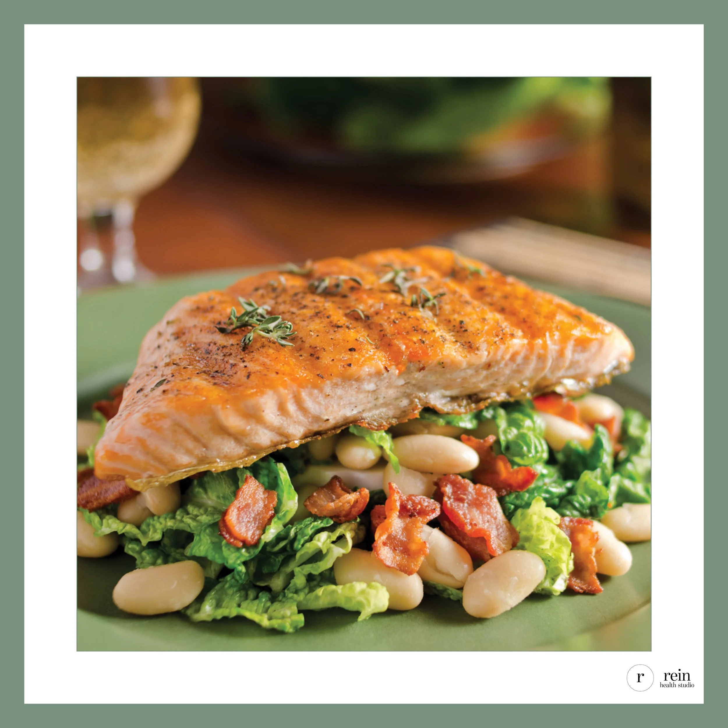 Crispy Salmon Over Warm White Beans + Greens