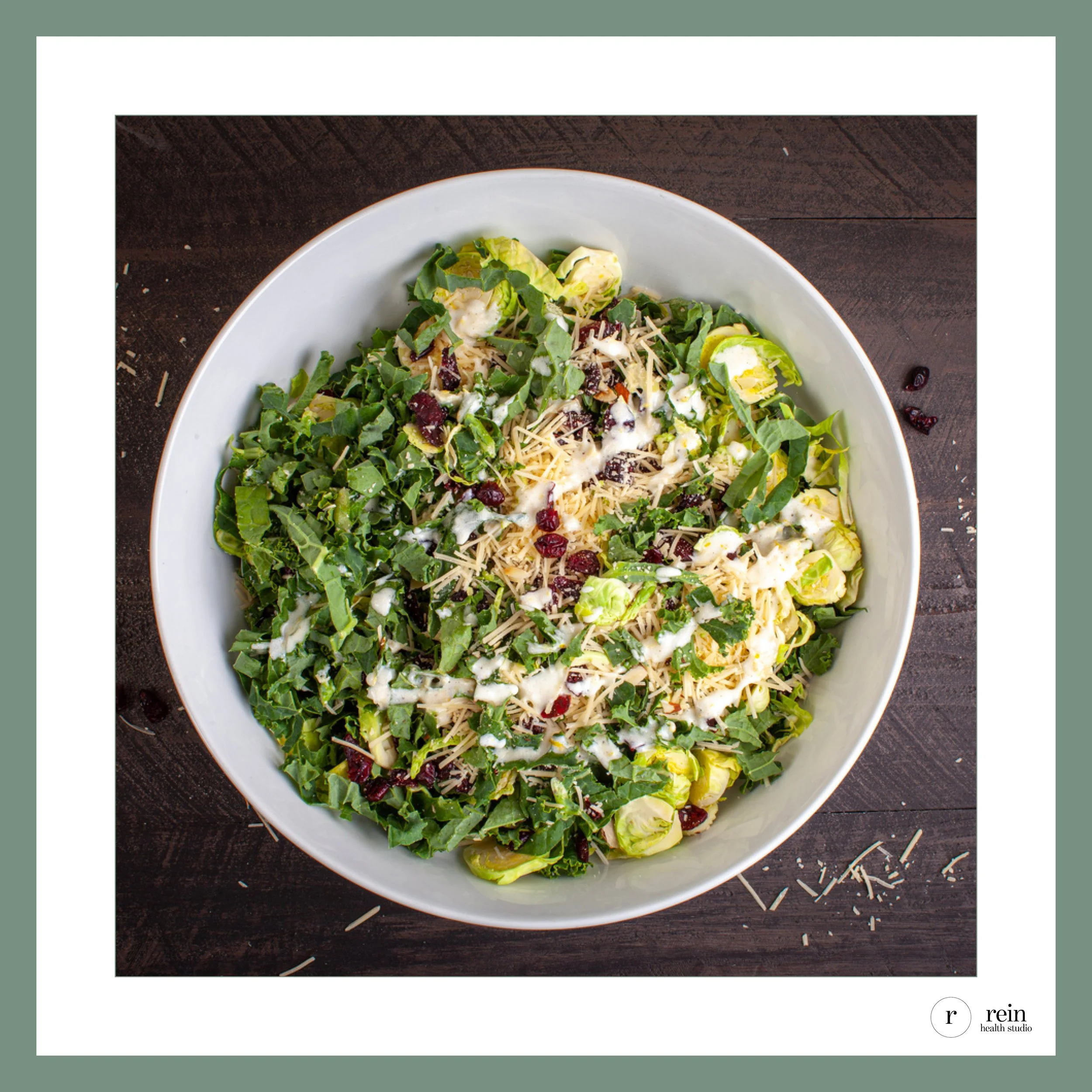 Kale + Brussels Sprout Salad w/ Cranberries, Parmesan + Creamy Dressing