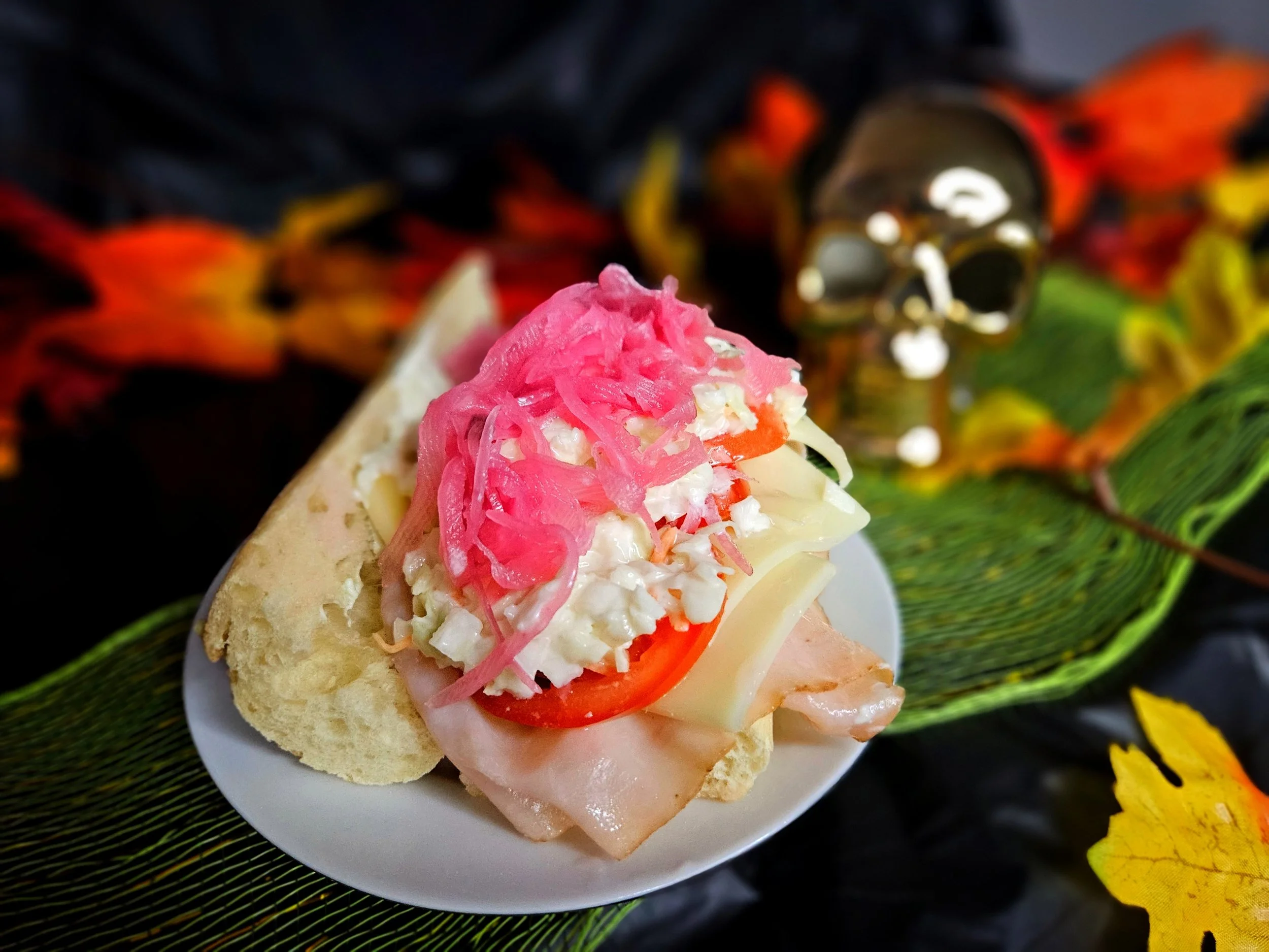 Sandwich - French Baguette with turkey, swiss, tomato, coleslaw, and pickled onions