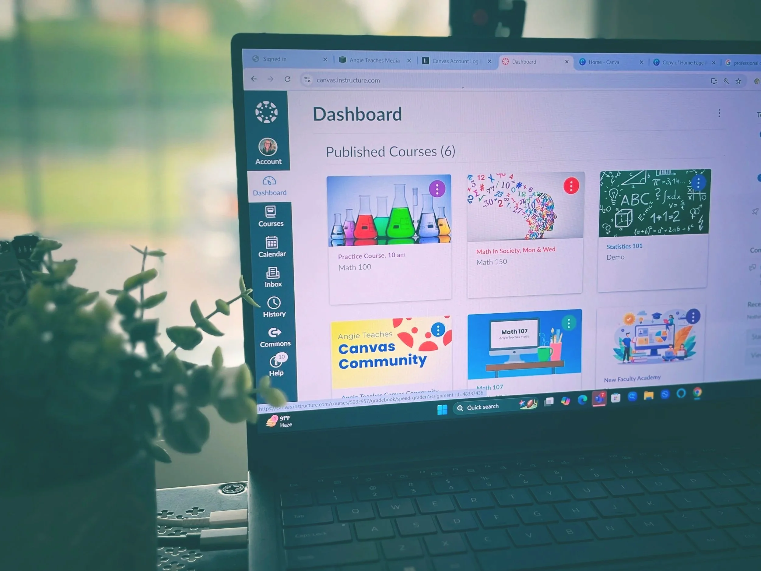Open laptop with Canvas on the screen