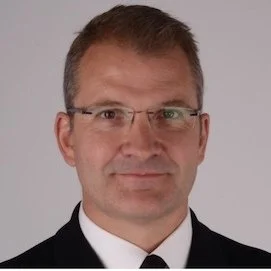 Surgeon Commodore Jason Smith