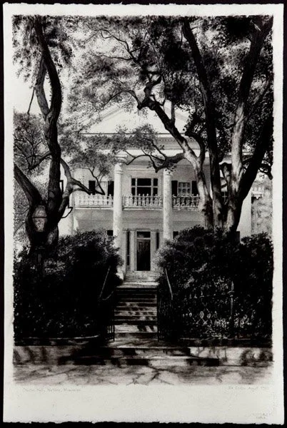 Black and white drawing of a large house with classical columns, surrounded by trees and bushes, with steps leading up to the entrance.
