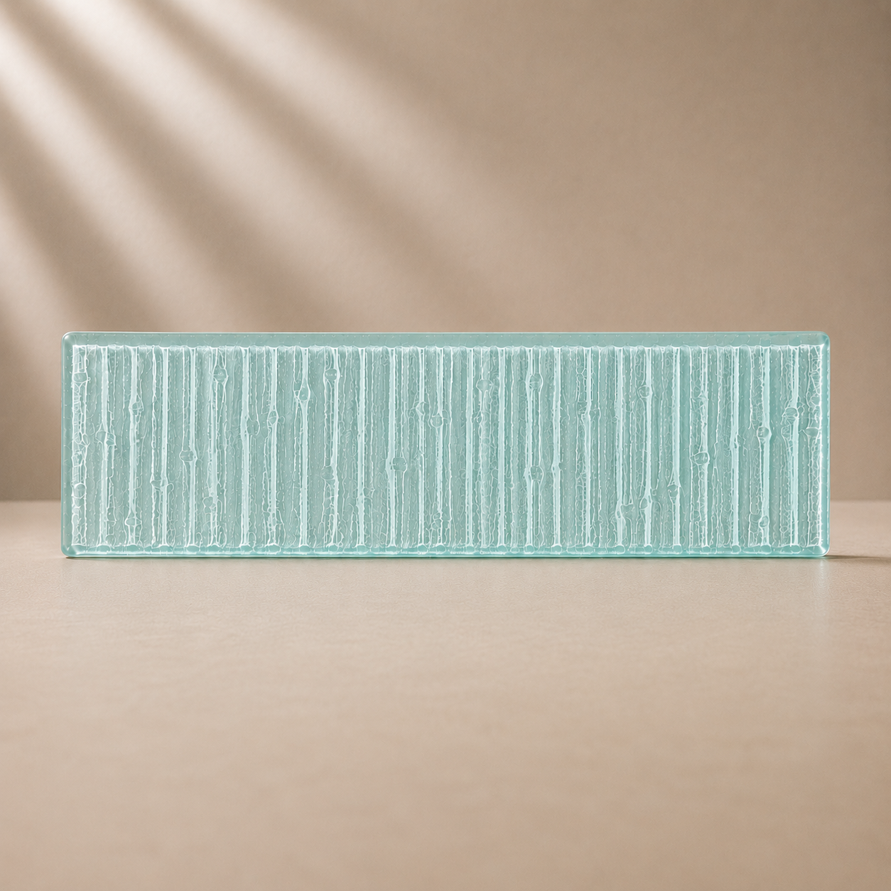 Handcrafted linear glass tile in Sea Glass for kitchen backsplashes, bathrooms, and feature walls.