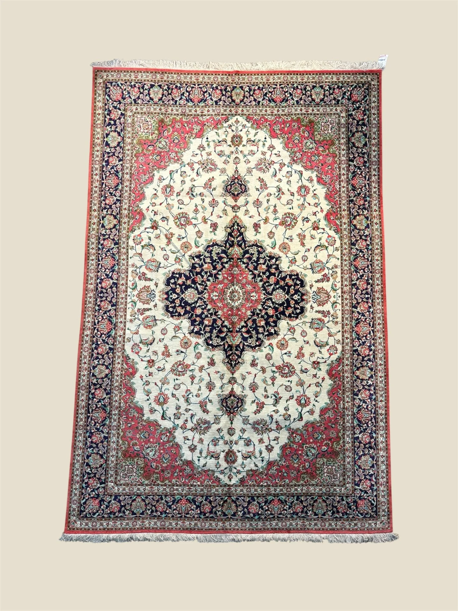 Handmade Persian wool rug in Orange County showroom.