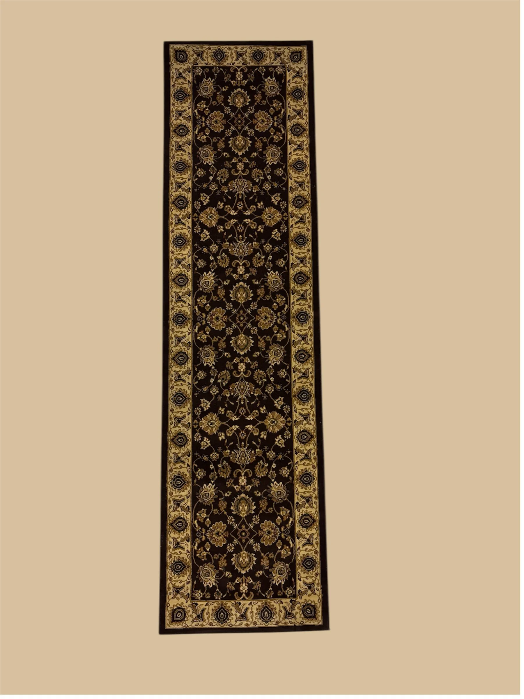 A rectangular area rug with a black background and intricate gold floral patterns bordered by a gold and black design.