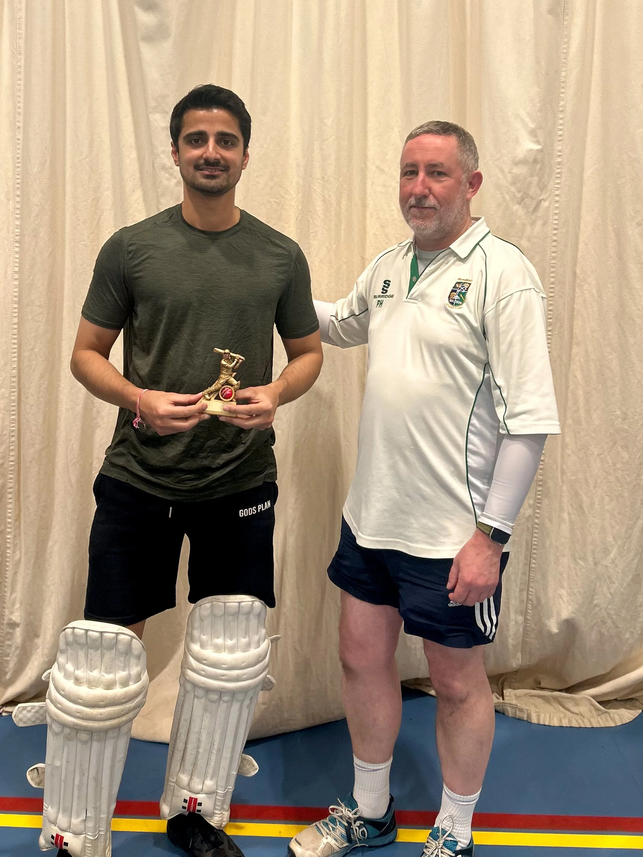 Gajander Singh picks up the trophy for the leading batter in ESCA Division 3